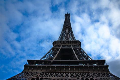 Eiffel Tower In Cloudy Blue Sky In Paris France Stock Photo Image Of