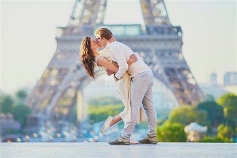 Happy Romantic Couple In Paris Near The Eiffel Tower Stock Image