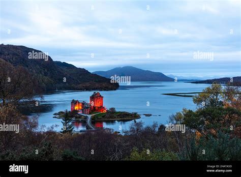 Eilean Donan Castle In Red Light For Poppy Day Stock Photo Alamy