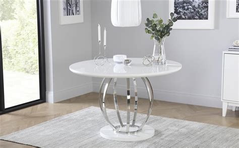 We bought the white leather, which is beautiful. Savoy Round White High Gloss and Chrome Dining Table with ...