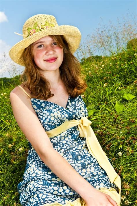 Young Girl Sitting In Meadow Stock Photo Image Of Relaxing Pretty