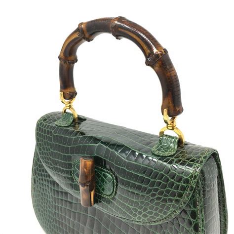 Vintage gucci bamboo handtasche wildleder braun gold bambusholz luxus tasche. Gucci Vintage Bamboo Green Crocodile Leather Bag at 1stdibs