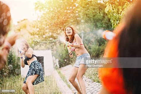 Adult Water Gun Fight Photos And Premium High Res Pictures Getty Images