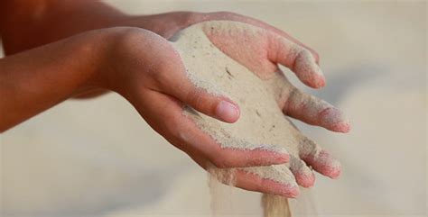 Strewing Sand Through Fingers Stock Footage Videohive