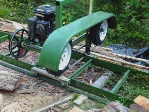 3.8 horsepower 2 cycle harbor freight cement saw motor, 3/4 inch x 3 teeth per inch bandsaw blade. Homemade Bandsaw Mill - HomemadeTools.net