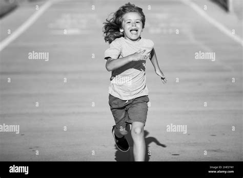 Cheerful Boy Running To School Kids Run Race Stock Photo Alamy