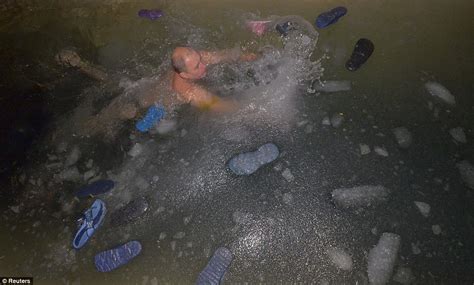 Come On In The Water S Freezing Hundreds Of Russians Take Chilly Dip In Icy Rivers As They