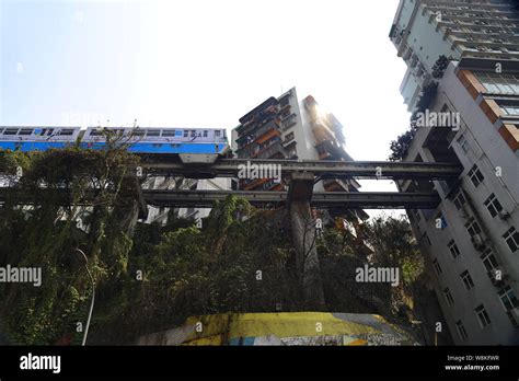 A Subway Train Of Chongqing Light Rail Line Travels On The Monorail In Chongqing China