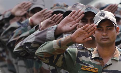 indian army soldier saleem miyan r and his colleagues salute in srinagar the youth