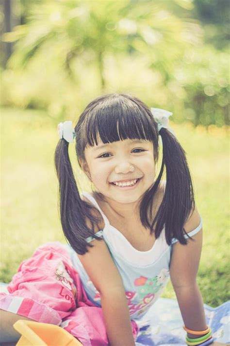 Asian Little Girl Smiling Stock Photo Image Of Girl 65402240