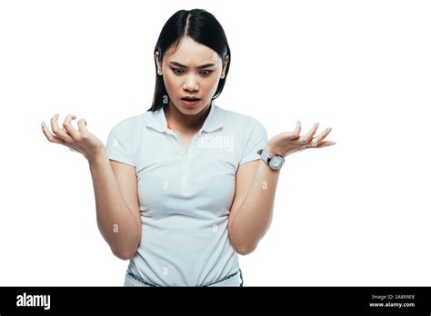 Shocked Attractive Asian Girl Showing Shrug Gesture Isolated On White Stock Photo Alamy