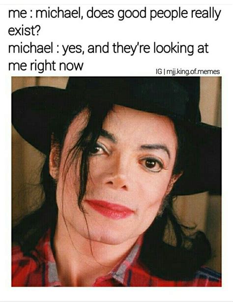 Michael Jackson Is Looking At The Camera With His Hat On And Caption