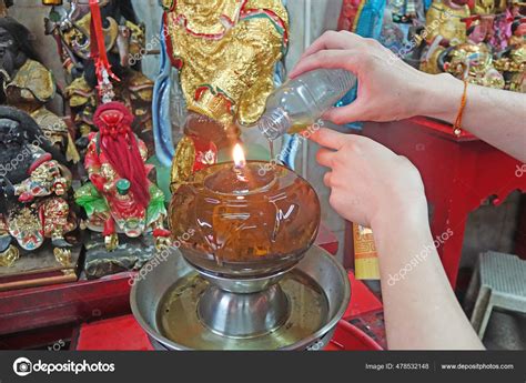 Adding Oil Lamp Taoist Temple Selective Focus Stock Photo By ©cheattha