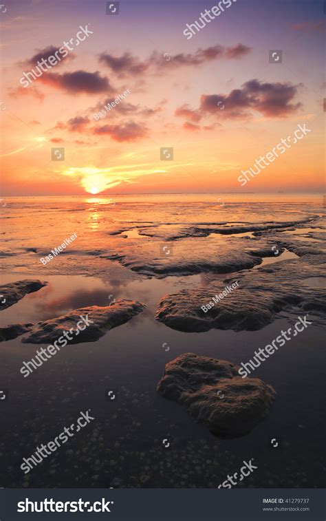 Beautiful Tranquil Sunset Over The Ocean Stock Photo