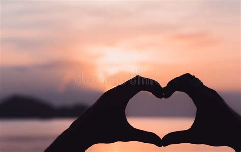 Hands Forming A Heart Shape With Sunset Stock Photo Image Of Icon