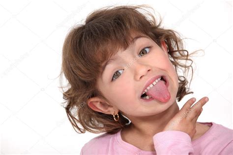 Little Girl Sticking Tongue Out ⬇ Stock Photo Image By © Photography33