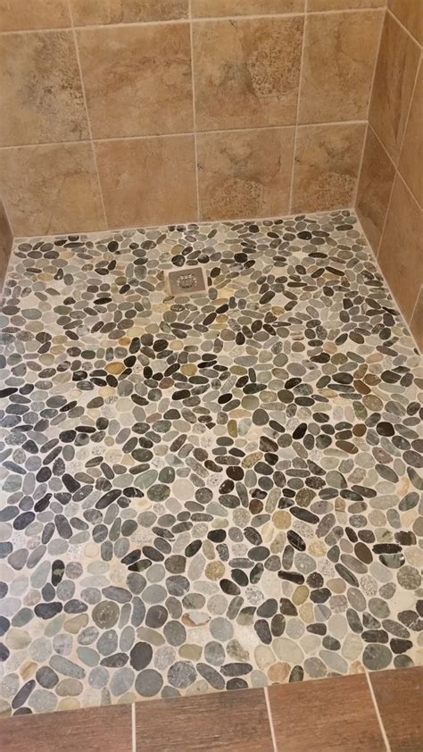 The experts show how to remove the old flooring and install the limestone tile to give any room a facelift. Bathroom: Very Beautiful For Bathroom With Pebble Tile ...