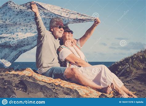 Happy Senior Caucasian Couple Enjoy The Outdoor Leisure Activity