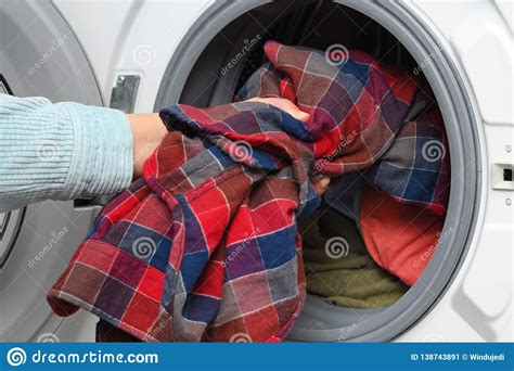 Woman Puts Clothes In Washer Stock Image Image Of Washing Wash