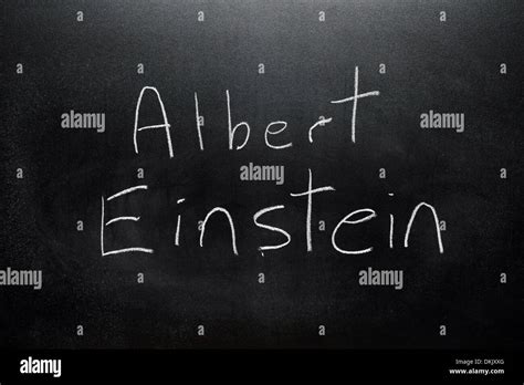 A Blackboard With The Name Albert Einstein Written On It In White Stock