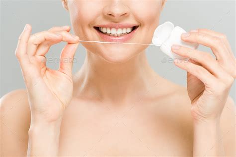 Cropped View Of Cheerful Naked Woman Holding Dental Floss Near Teeth