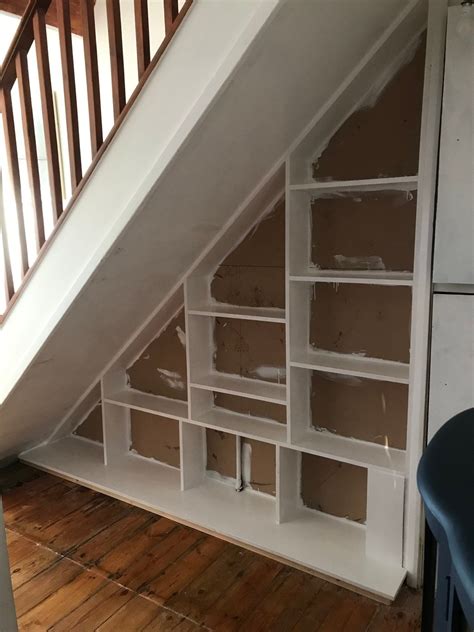 You can use this space as a storage space. storage, under stairs, under stairs storage, shelves, small spaces, office space, small office ...