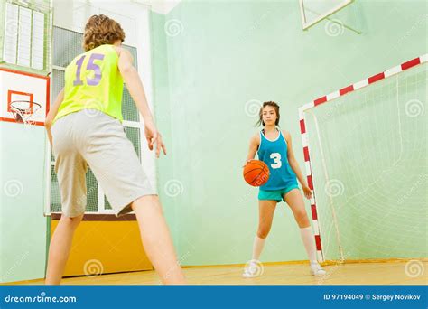 Teenage Girl Dribbling Basketball During The Match Stock Image Image