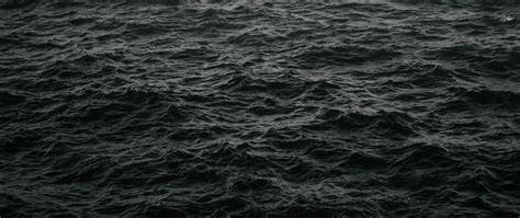 Download Wallpaper 2560x1080 Waves Ripples Dark Water Sea Dual Wide