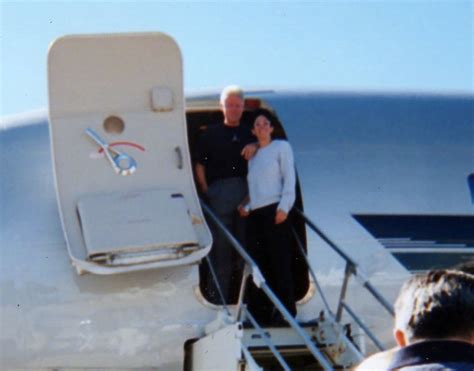 Bill Clinton Poses With Epstein’s ‘pimp’ Ghislaine Maxwell And A Sex Slave On Board Private Jet