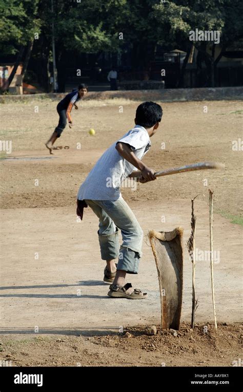 Hma78721 Indian Children Playing Cricket In Playground Stock Photo Alamy
