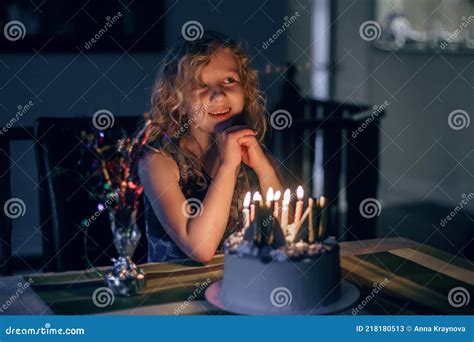 Cute Funny Blonde Girl Blowing Candles On Her Birthday Cake In Dark Room Happy Birthday Party