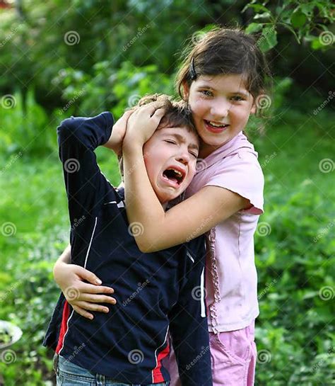 Girl Comforting And Hugging Crying Brother Boy Stock Image Image Of