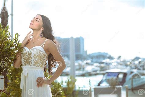Sensual Curly Brunette In White Dress Enjoying Stock Image Image Of Elegant Brunette 63753117