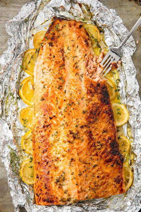 This Oven Baked Garlic Butter Salmon Is The Easiest Way To Feed A Crowd Recipe Baked Salmon