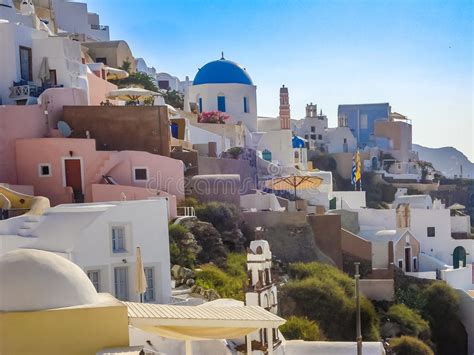 White Houses Churches And Blue Domes In Oia Village Editorial Image