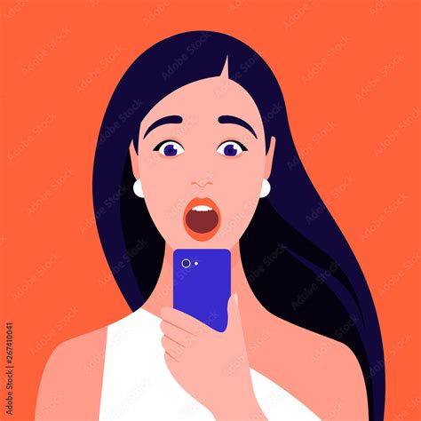 Shocked Girl Looks Into Her Smartphone Portrait Of A Woman Who Opened Her Mouth In Surprise