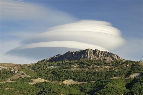 Lenticular Clouds Over Dornajo Mountain Photograph By Guido Montanes
