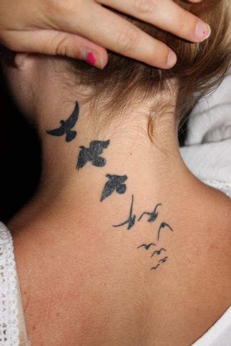 Neck Tattoos Bird Tattoomagz › Tattoo Designs Ink Works Body