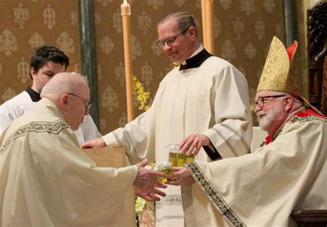 the catholic post priests renew promises as sacramental oils are blessed at annual chrism mass