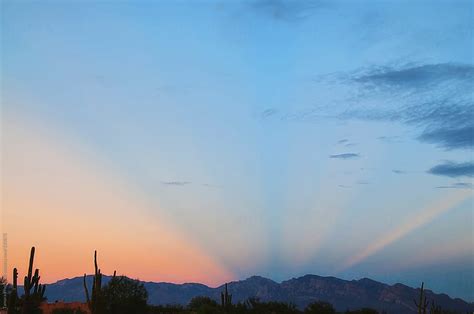 Mountains With Sun Rays By Stocksy Contributor Tamara Pruessner