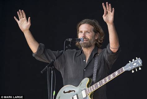 Wearing his birthday wig from jimmy, bradley took to the audience as he extremely accurately played along to neil young's solo from 'down by the river'. Bradley Cooper performs at Glastonbury festival | Daily ...
