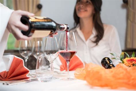 Waiter Serving Wine In A Fine Restaurant Stock Image Image Of Female