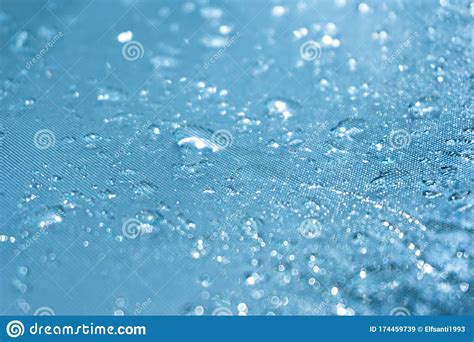 Rain Drops On The Blue Glass Bokeh Background Shiny Raindrops On A
