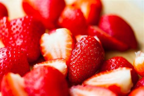 Closeup View Of Fresh Strawberries Sliced And Cleaned Strawberries