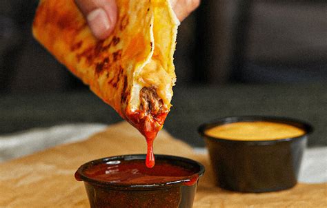 Taco Bell Is Testing New Grilled Cheese Dipping Tacos