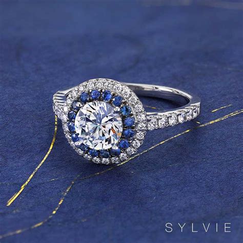 Also special is the coordinating baby blue sapphire side stones. Ring of the Month Double Halo Blue Sapphire Engagement Ring
