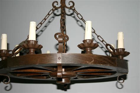 Looking for a good deal on wrought iron chandeliers? A Wood / Wrought Iron Round 8-light Chandelier from ...