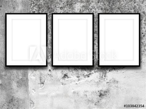Close Up Of Three Black Picture Frames On Weathered Concrete Wall Background Acquista Questa