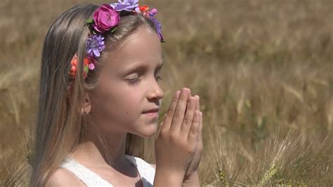 Little Girl Praying Child With Eyes Closed Saying Prayer