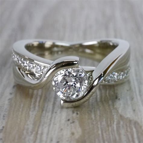 Round Bezel Set Engagement Ring With Bridge Design